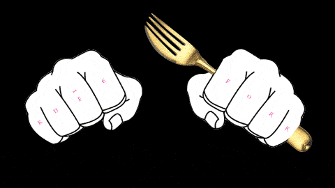 An animated gif of fists that shake, holding a utensil