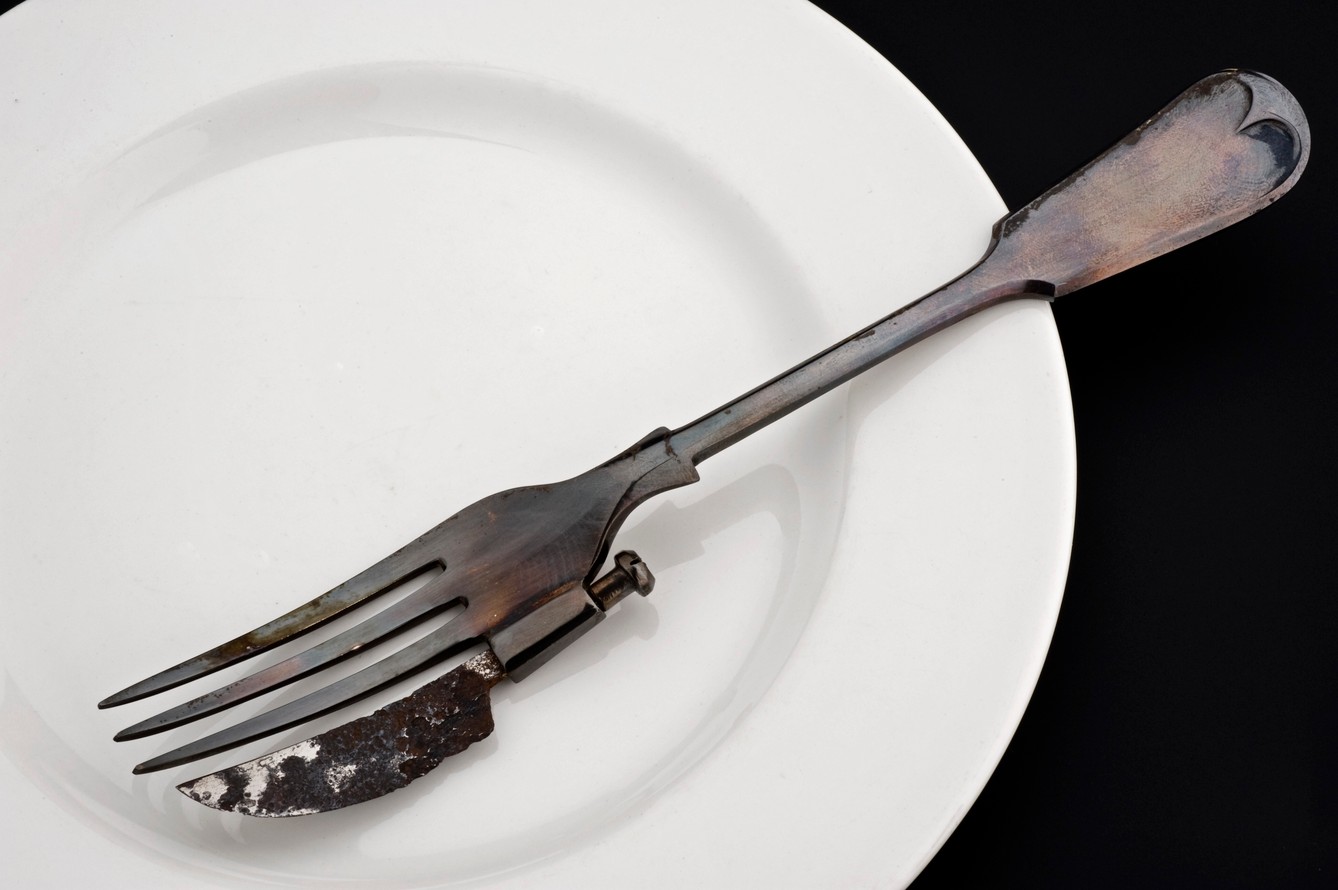 A fork on a white plate